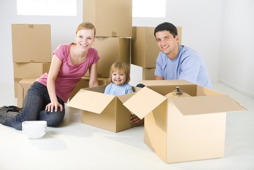 Removal team preparing items safely for a man with van move