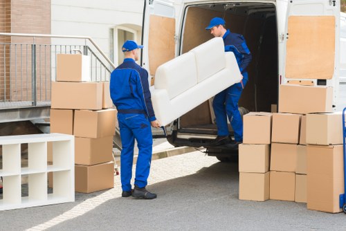 Removal team handling access challenges in a flat or townhouse move