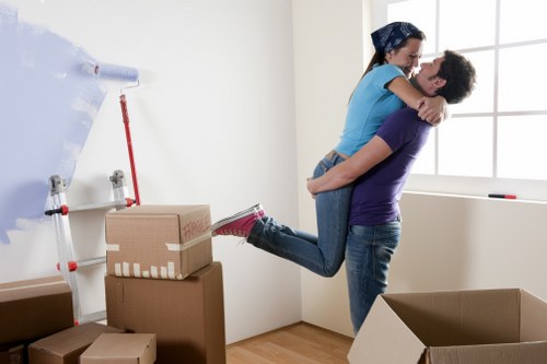 A professional man and van team assisting with a flat move in Removalservices