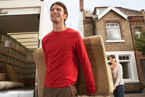Mover wearing PPE during a professional home relocation