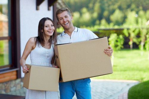 Local removals crew handling an office move with care