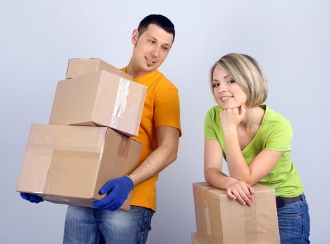 Organised office move with labelled boxes and loading process
