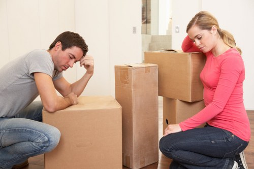 Packed moving boxes and furniture prepared for a removal service