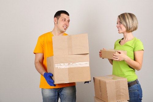 Team separating recyclable items by material type during a clearance
