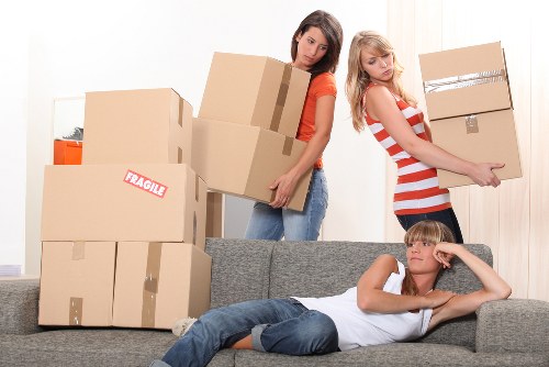 Moving day preparation with labelled boxes and home contents