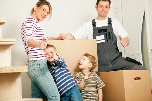 Movers loading household items for a flat or house move in Removalservices