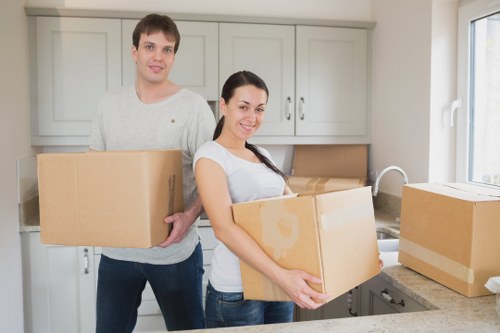 Packed boxes and furniture arranged inside a moving van